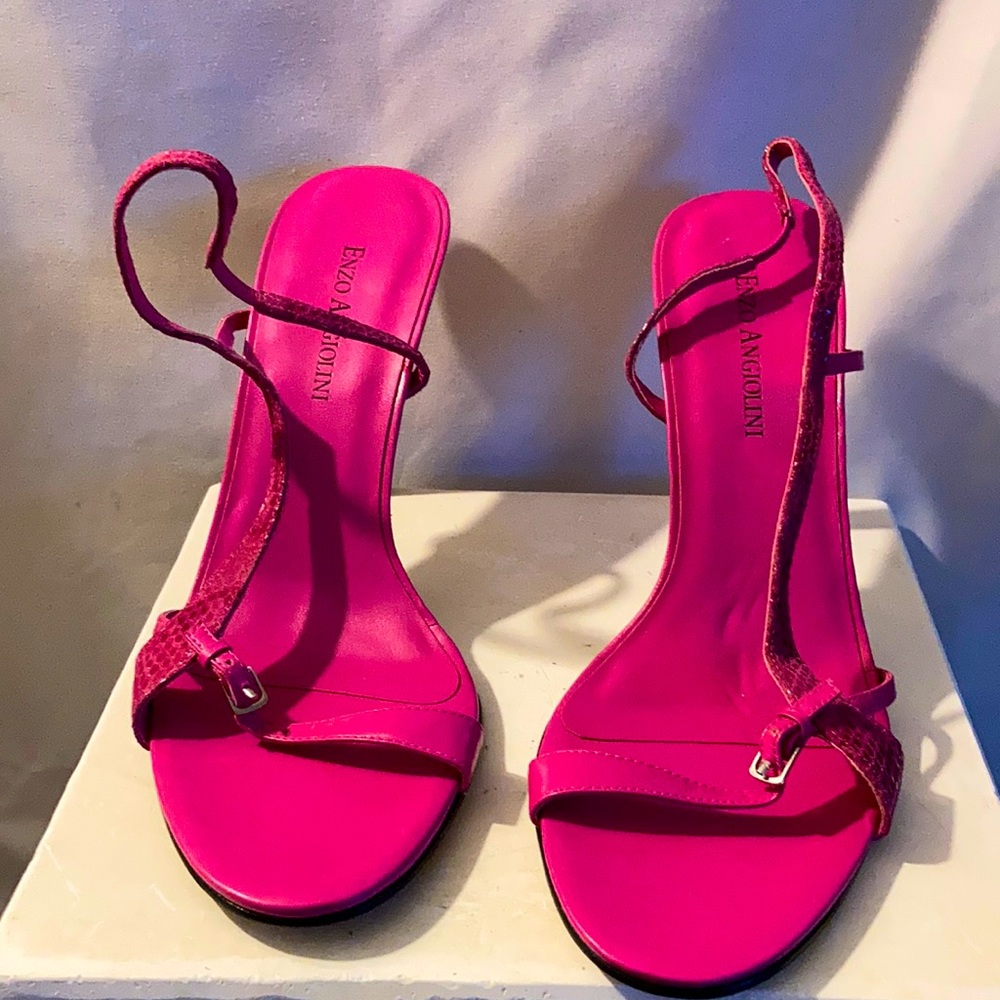 Pink Enzo sling backs.